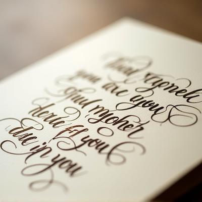 Detailed shot of flourishing calligraphy on a greeting card